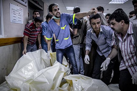 ارتفاع عدد الشهداء جراء الغارات الصهيوني على غزة العدوان الاسرائيلي على غزة في يومه الخامس عشر