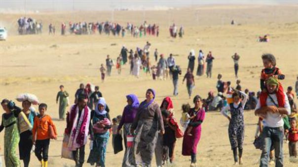 الايزيديون يهربون من "داعش" ’داعش’ فخور باستعباده النساء والاطفال الإيزيديين!!