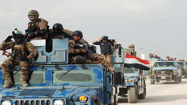 العراق: استعادة مرافق حيوية في كركوك .. والعبادي يأمر برفع الاعلام العراقية