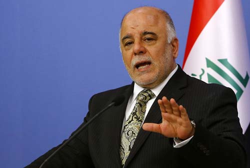 العبادي: اليد التي تمتد على الحشد الشعبي ستقطع