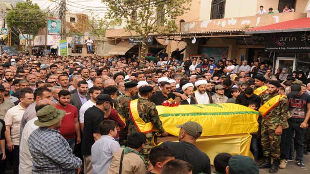 حزب الله شيع الشهيدين مصطفى فؤاد حنجول وعبد الحميد محمود شري الى مثواهما الاخير